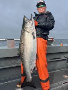 person-in-orange-with-large-salmon-1